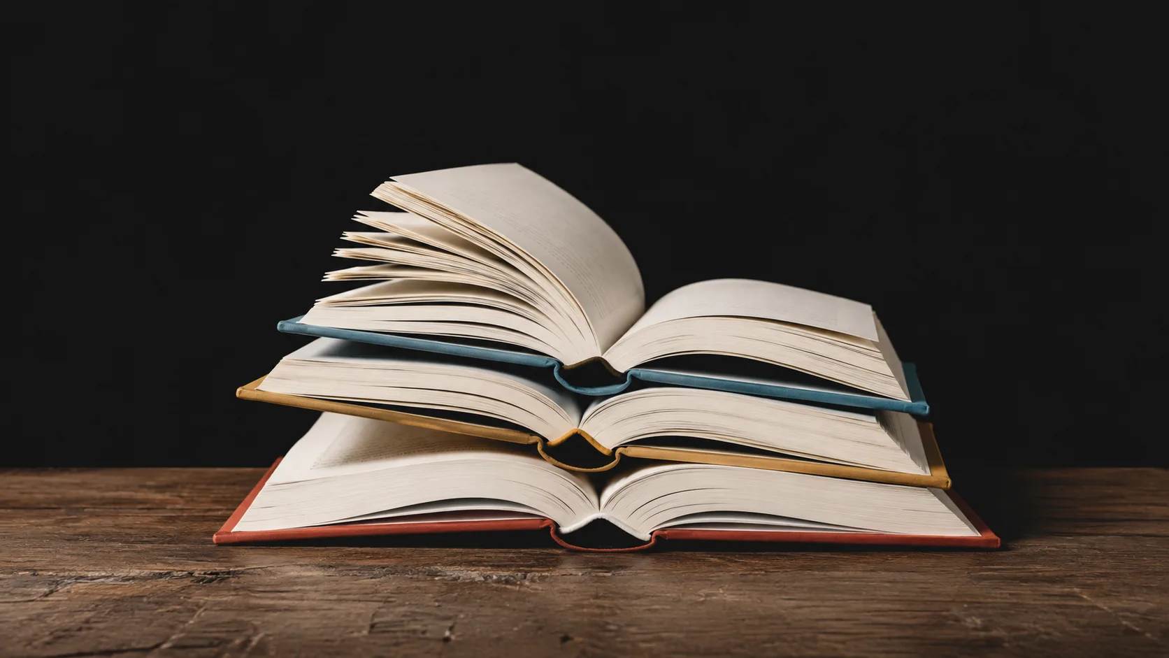 Multiple published novels arranged to show how different story structures can map the same core events in different ways.