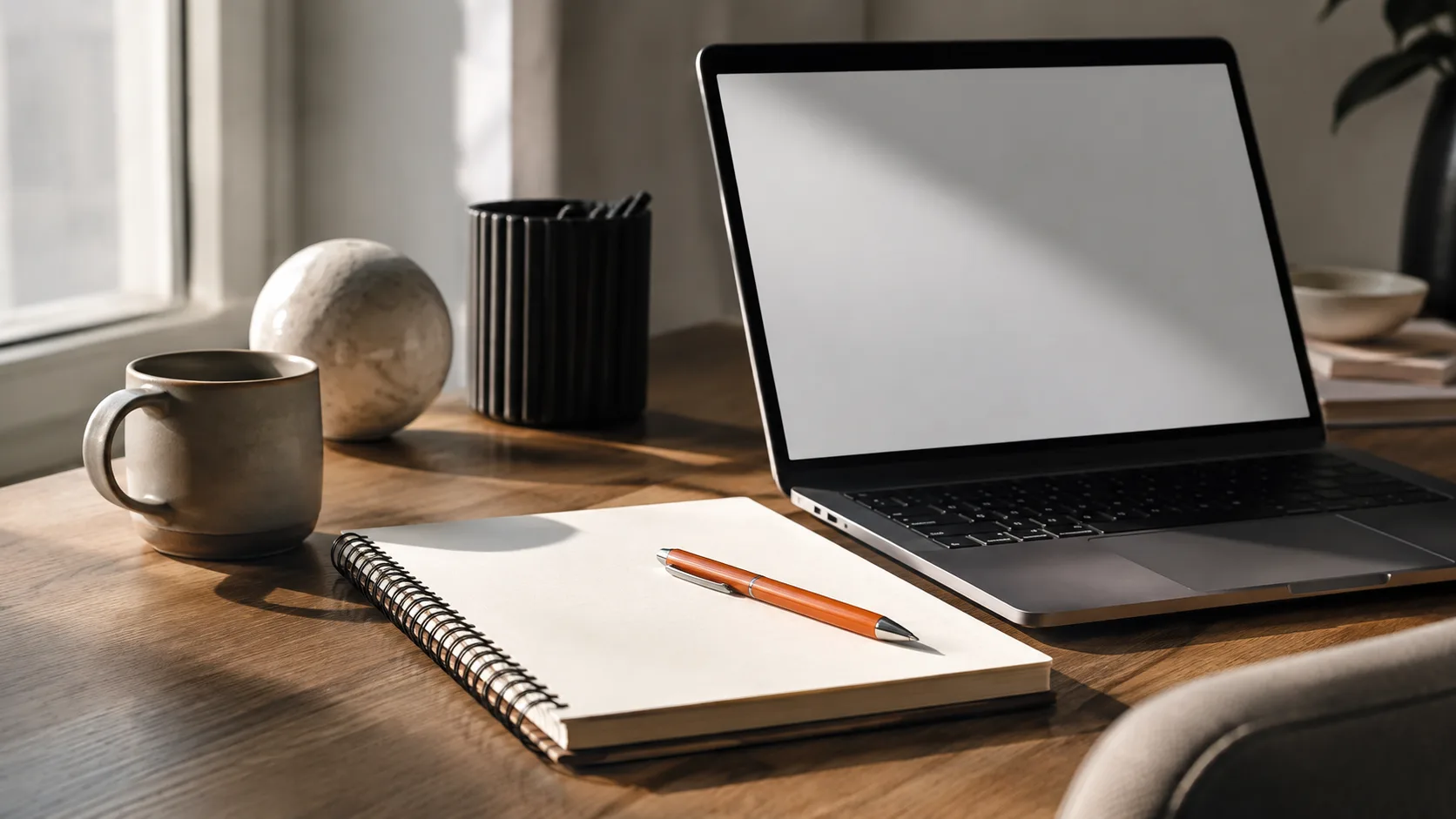 A workspace showing a notepad and computer setup, symbolizing the simple first steps to register and start with the Easy Commission Funnel