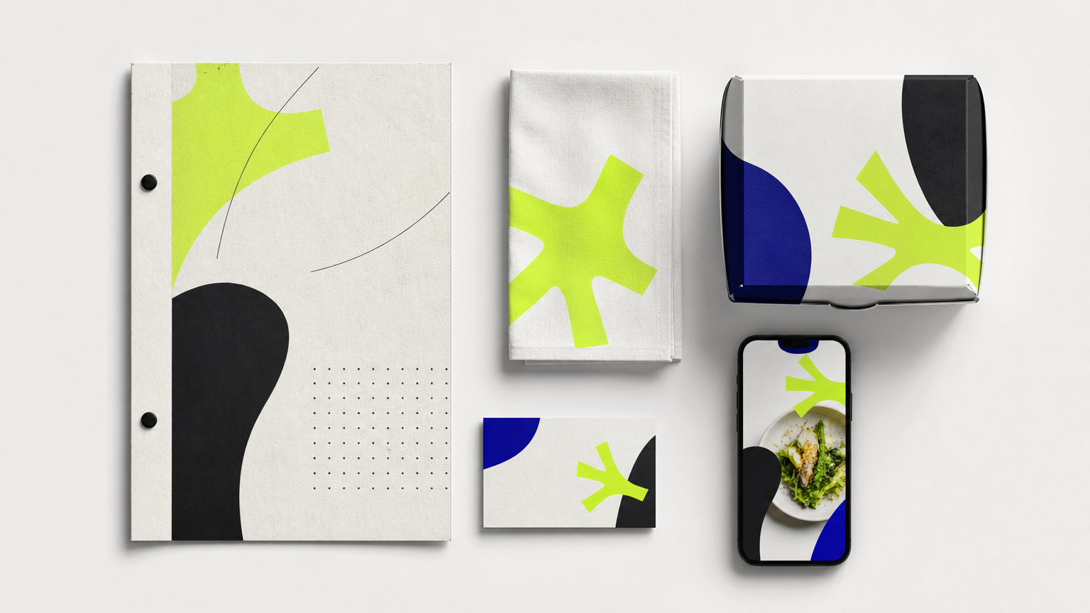 Restaurant brand identity system components including menu, signage, packaging, and digital assets displayed together to show consistency across touchpoints.