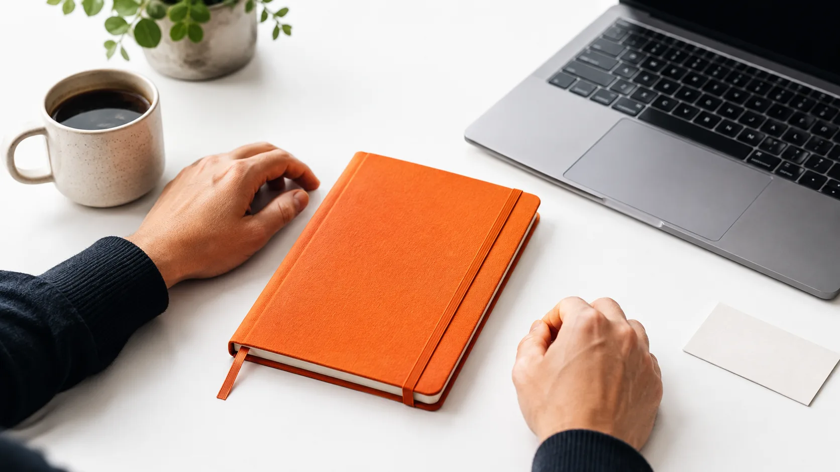 Workspace setup with laptop and notebook ready for affiliate account sign-in