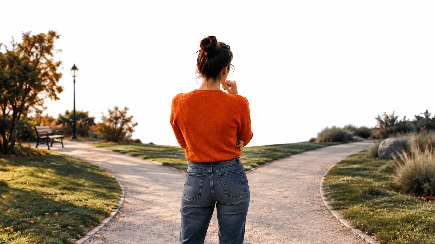 Person standing at a path fork choosing between quick gigs and long-term assets